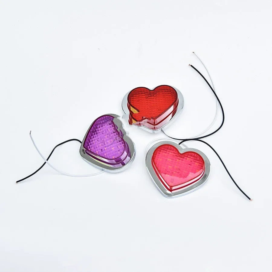 Heart-shaped 12V automotive LED sidelight unit in a choice of colours for vehicle fender modification.