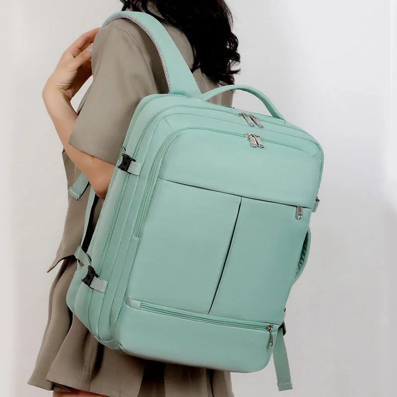 Large waterproof backpack with multiple pockets holding 15.6 inch laptop, shown in black colour option