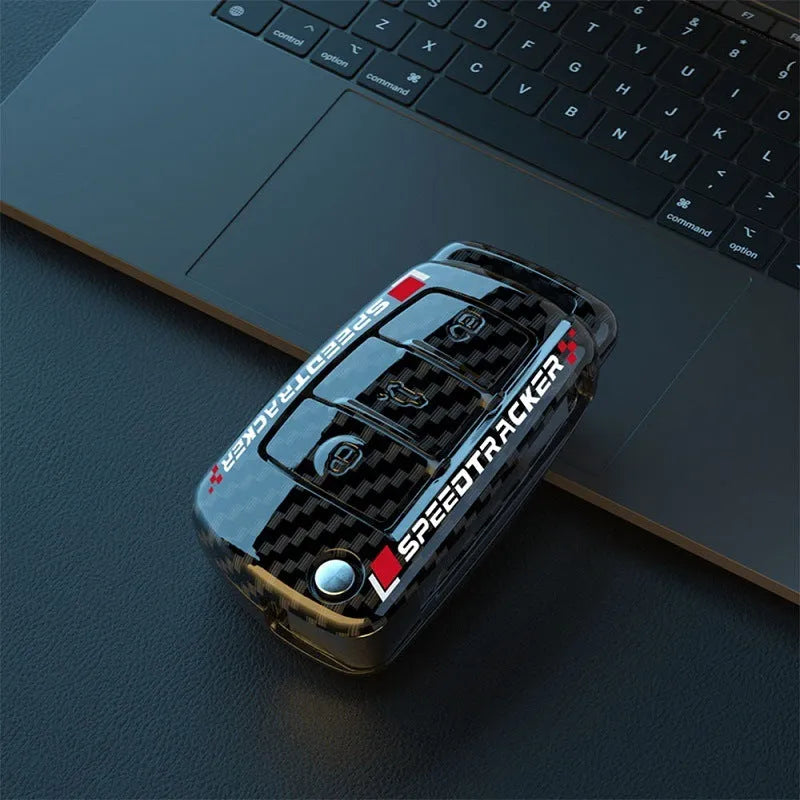 Carbon fibre pattern car key cover in black and white options with minimalist design