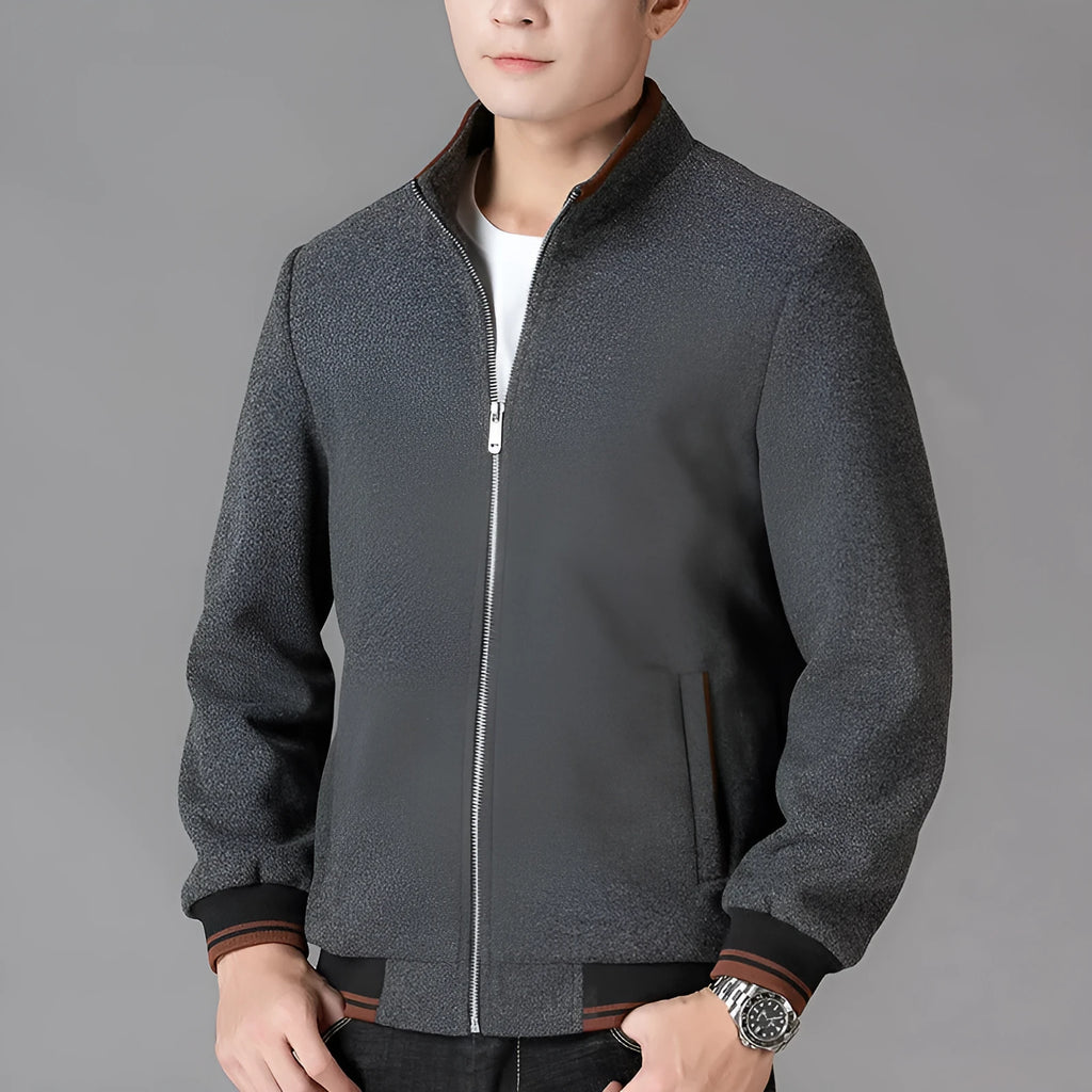 Men's gray polyester fleece autumn coat with long sleeves and side pockets on hanger
