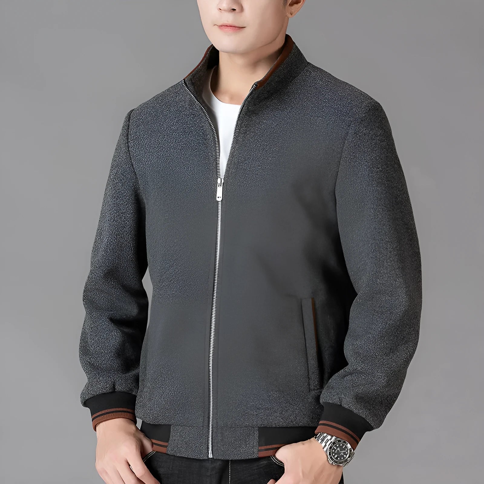 Men's gray polyester fleece autumn coat with long sleeves and side pockets on hanger