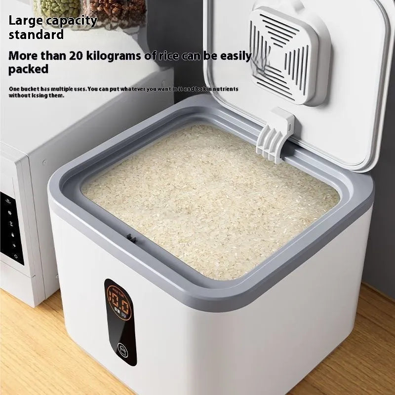 Grey plastic airtight rice storage jar with a lid and a free measuring cup on a kitchen counter.