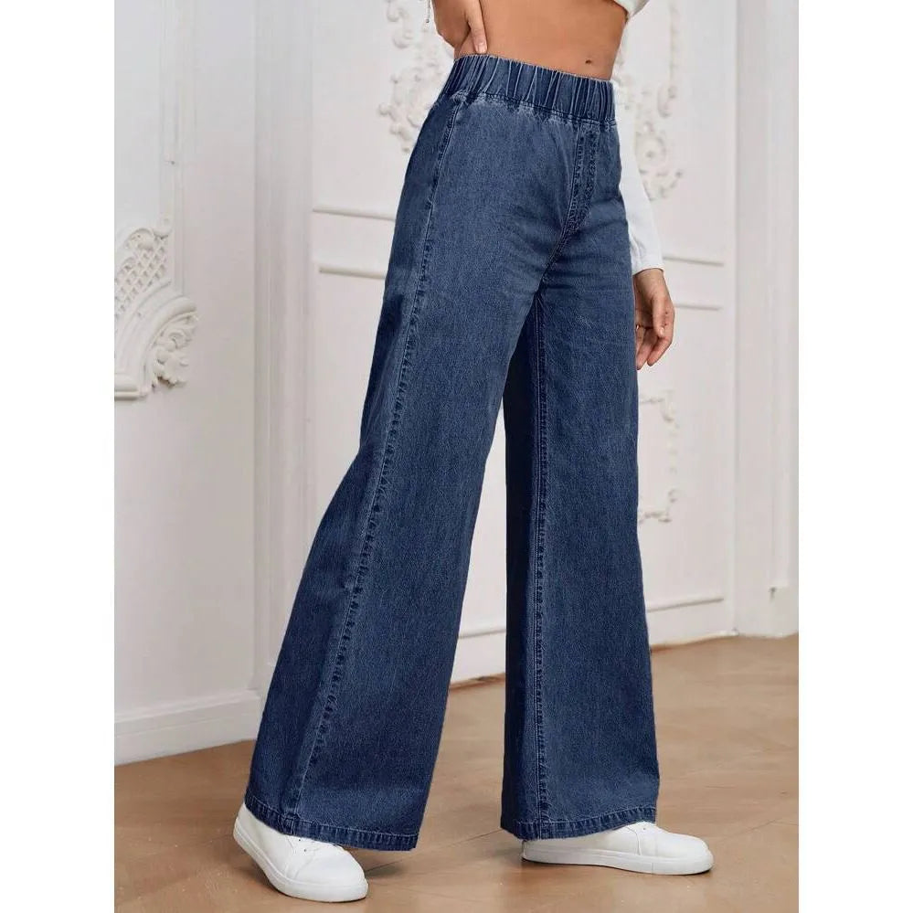 Light blue washed wide-leg straight cut jeans with mid-waist fit and zip fly opening