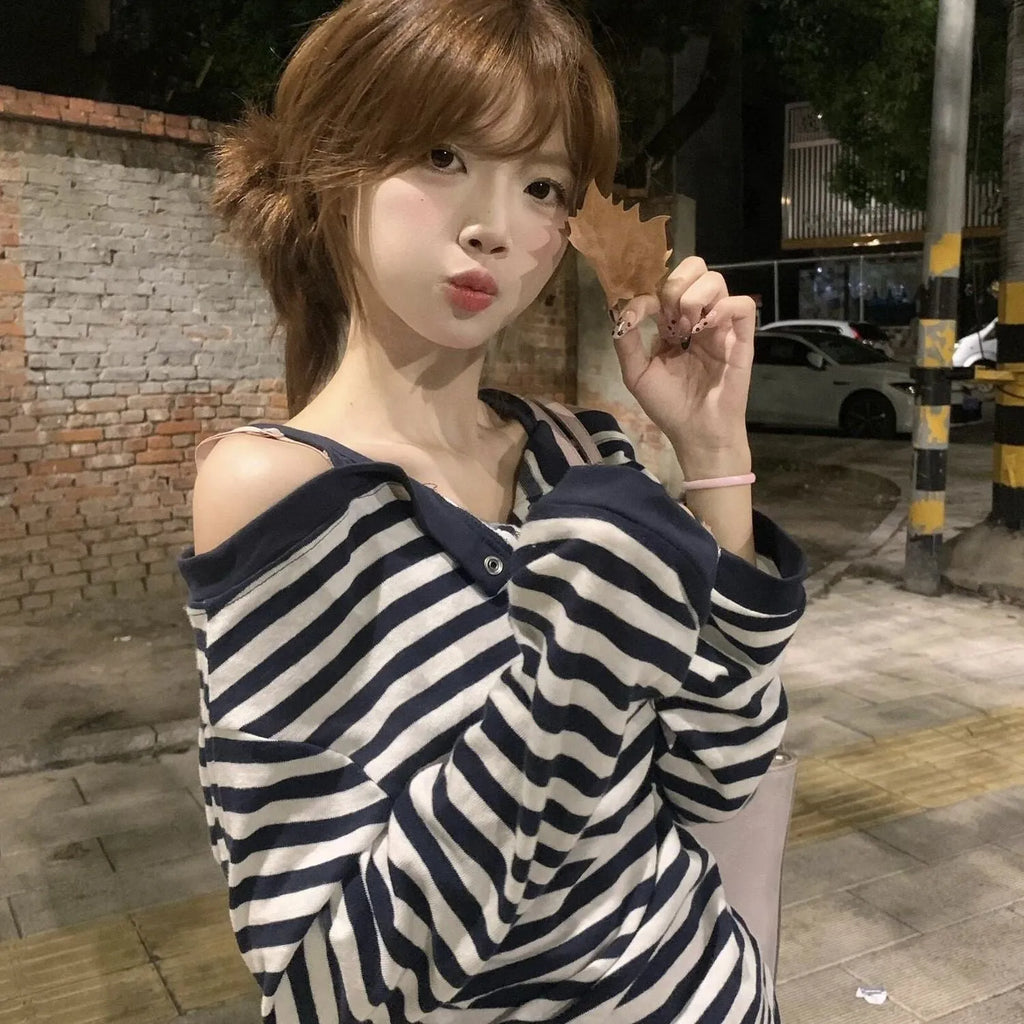 Dark blue striped women's oversized t-shirt with embroidery and button details