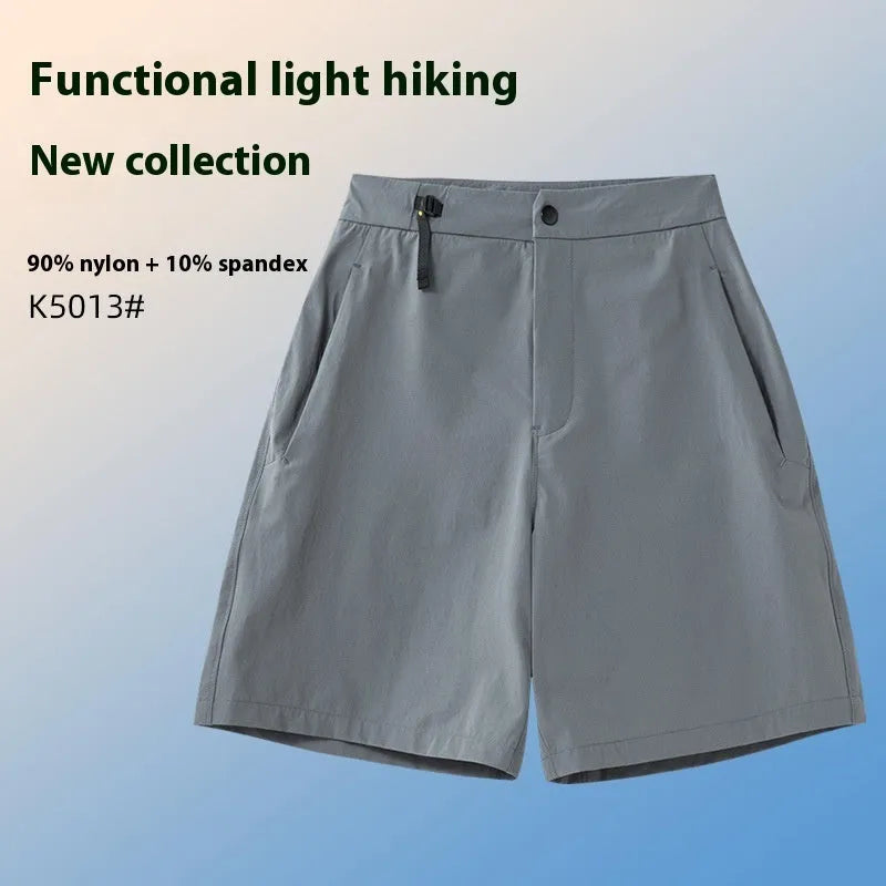Men's solid colour quick-drying sports shorts with a 3D elastic cut for running and climbing.