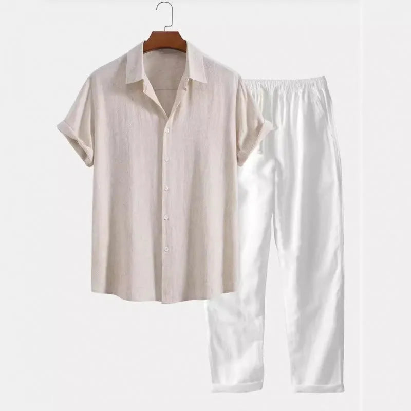 Man wearing a loose-fit linen-blend short sleeve shirt and matching casual trousers from a co-ord suit set.
