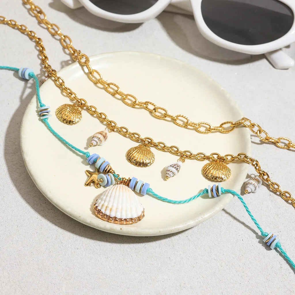Titanium steel pearl necklace with geometric shell pendant on adjustable chain
