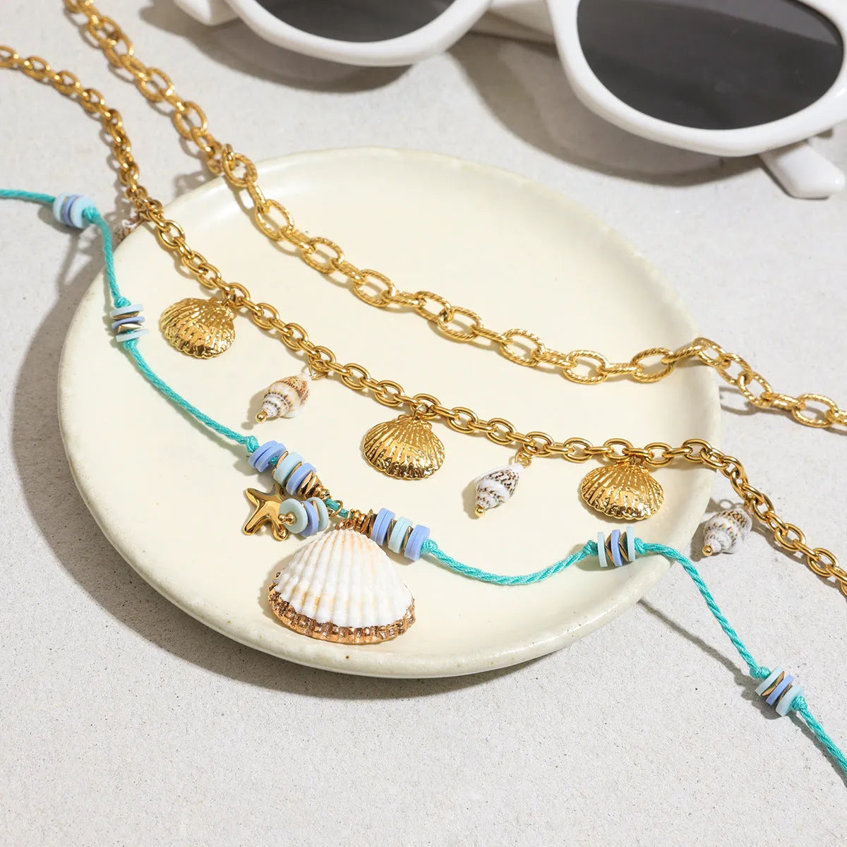 Titanium steel pearl necklace with geometric shell pendant on adjustable chain