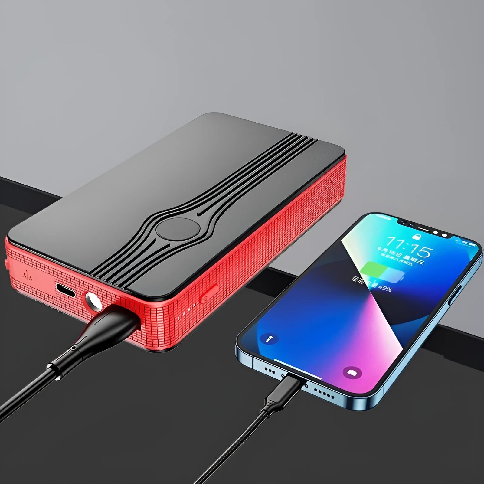 Red K4-E automobile emergency jump starter and power bank unit with data cable.