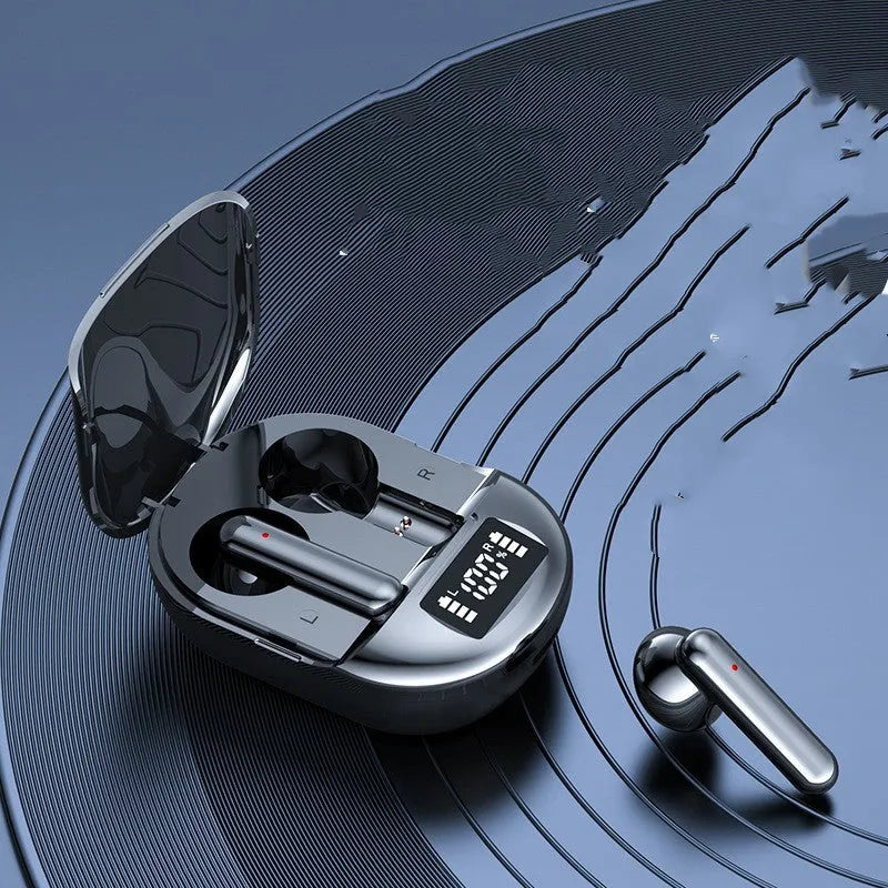 Black and white wireless Bluetooth headset with digital display screen and compact charging case