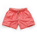 Men's straight leg beach shorts in polyester fabric for surfing and swimming