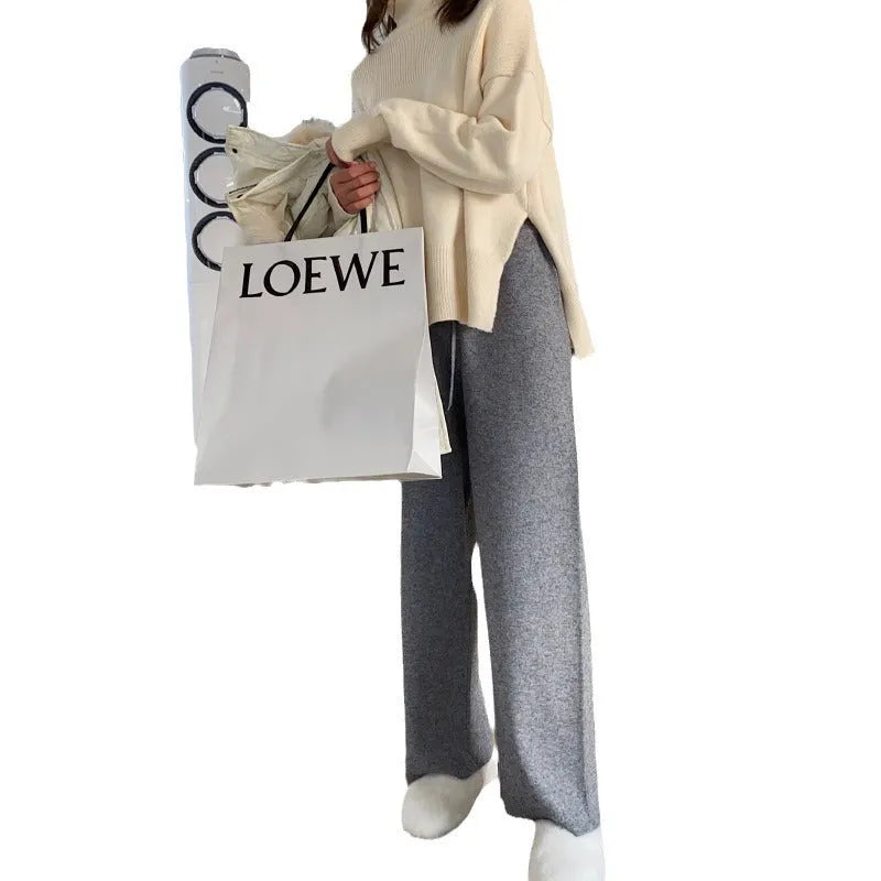 Women's high waist knitted wide-leg trousers in black colour with elastic waistband and straight-leg cut
