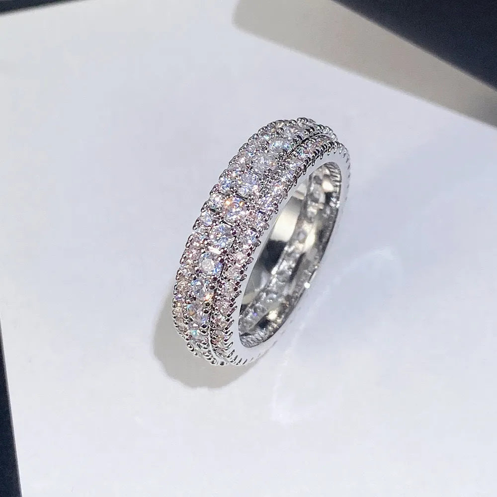 Geometric triangle engagement ring with zircon inlay and gang drill personalisation on copper band
