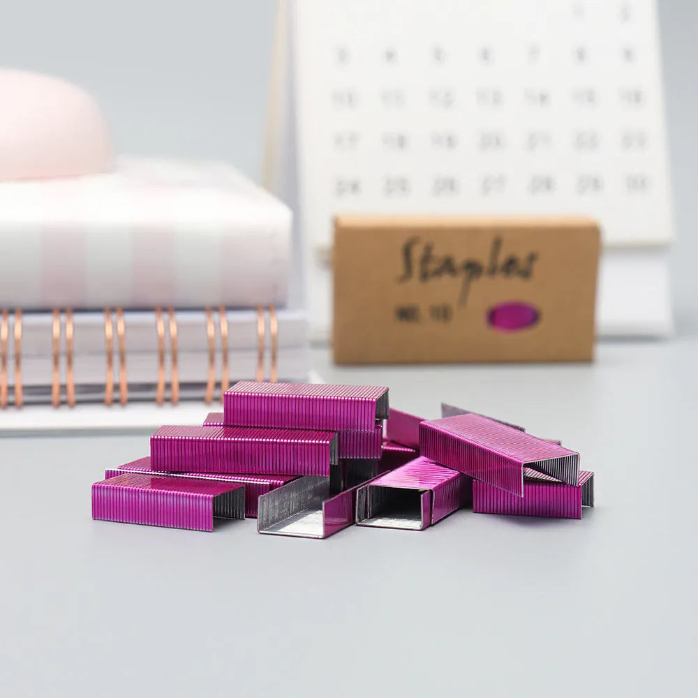 Box of 1000 metal stitching needles in rose gold, black, purple, and rose red colours for office use