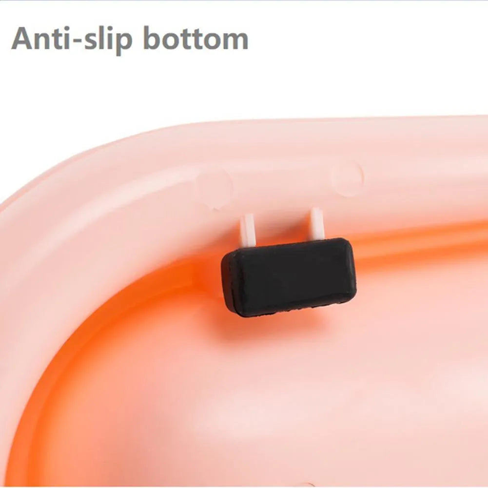 Set of four raised plastic pet bowls in green, pink and yellow colours with spill guard rims