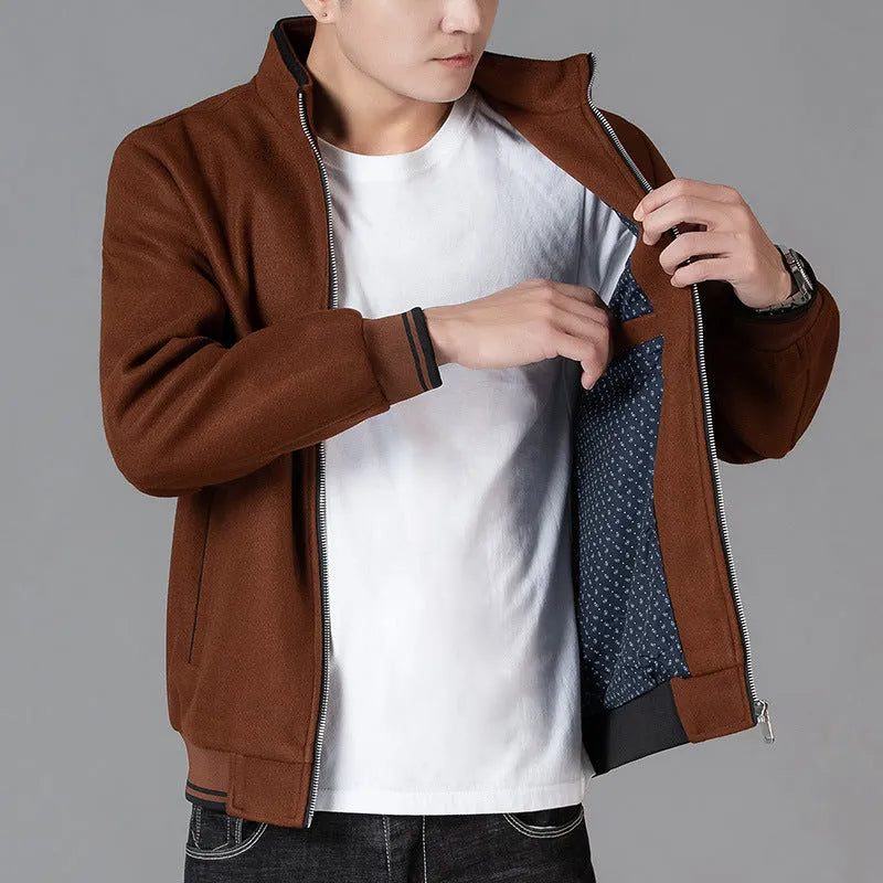 Men's gray polyester fleece autumn coat with long sleeves and side pockets on hanger