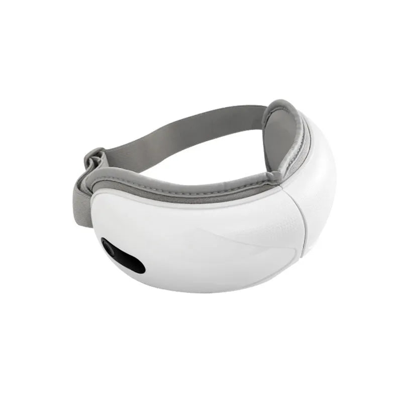 White rechargeable eye massager for hot compress and airbag massage relief