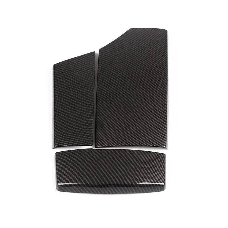 Three black ABS armrest box protective covers with carbon fibre pattern for car centre console