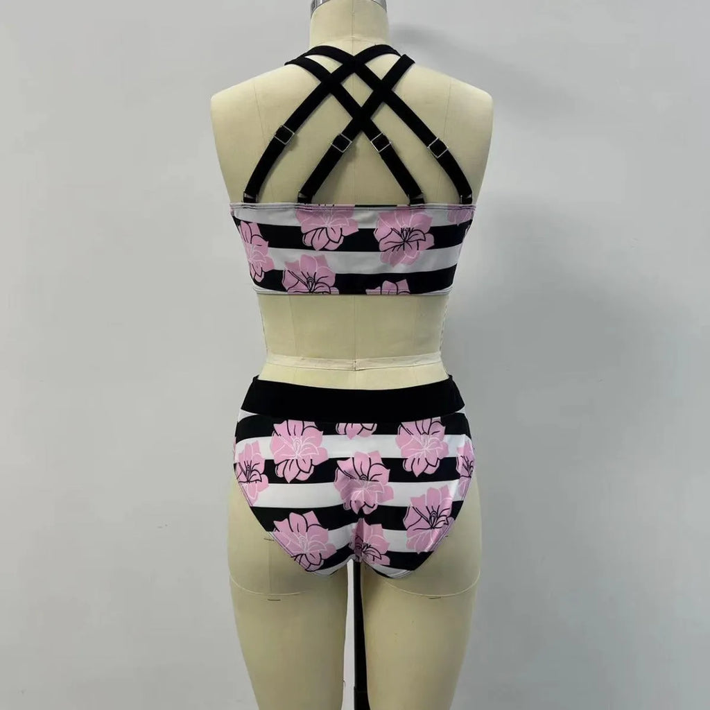 Black women's two-piece bikini swimsuit with printed belly cover design.