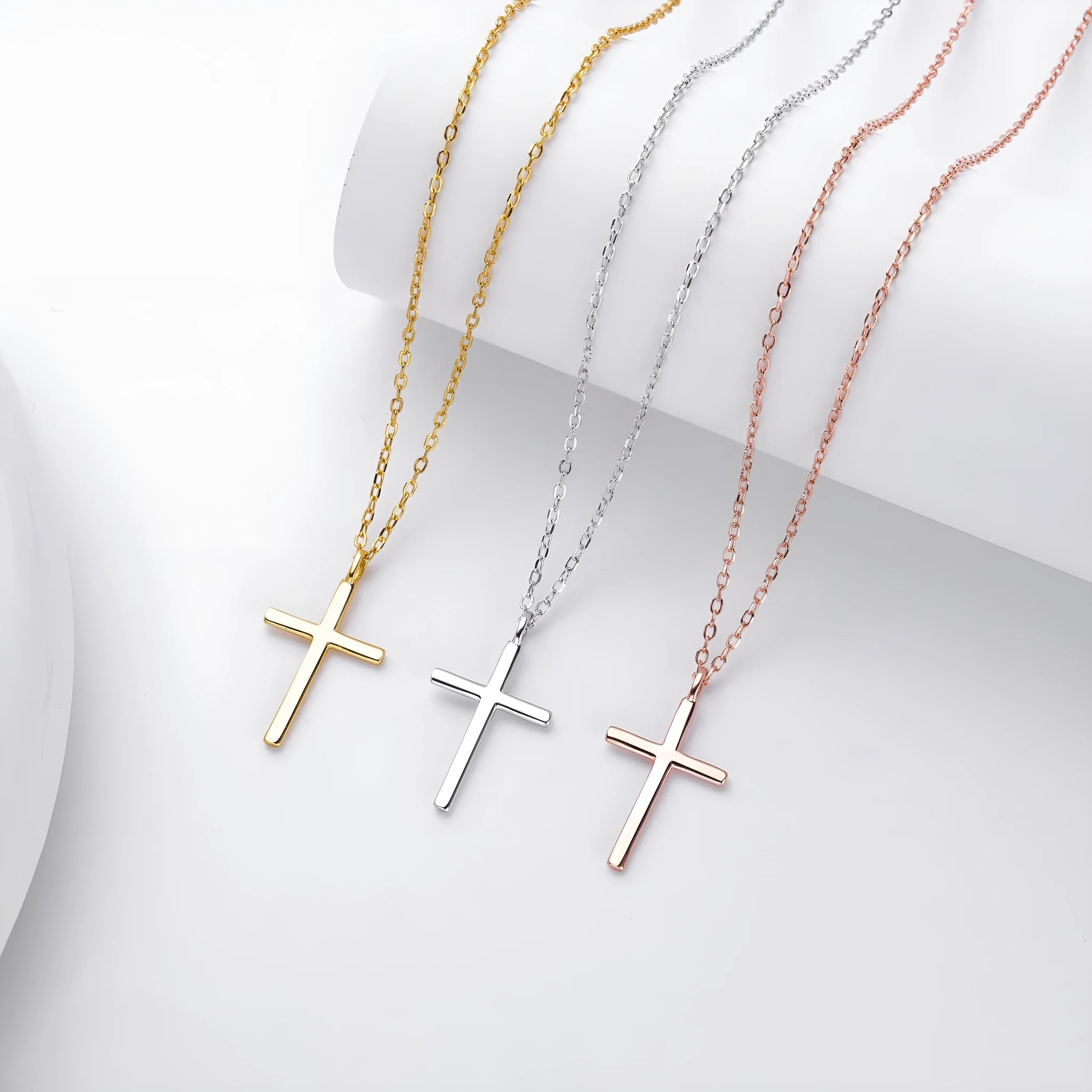 Sterling silver necklace with simple cross pendant on adjustable O-shaped chain in gold, platinum, or rose gold finish