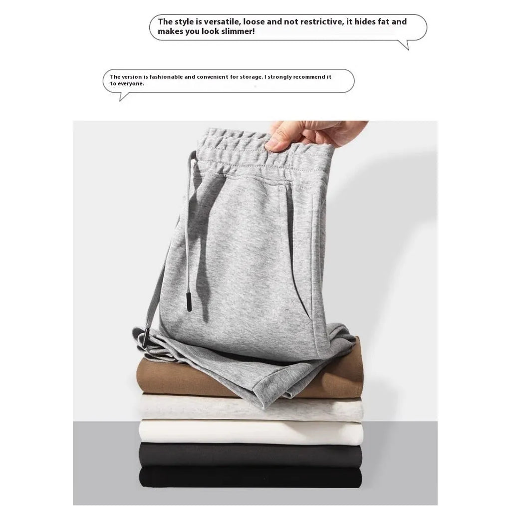 Cotton straight leg sports shorts in light grey colour showing relaxed fit and micro-elastic fabric