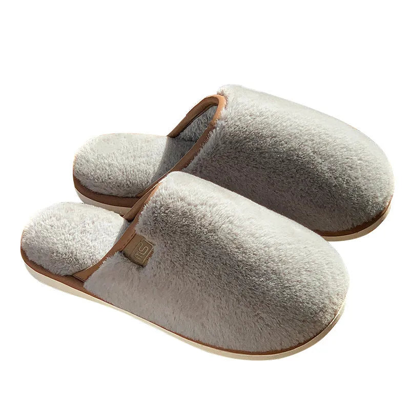 PVC plush winter slippers in a solid colour with a non-slip sole for indoor wear.