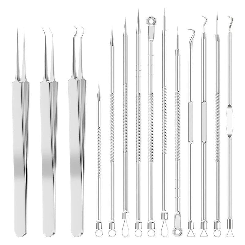 Four ultra fine metal acne needles and a metal acne clip laid out on a surface.