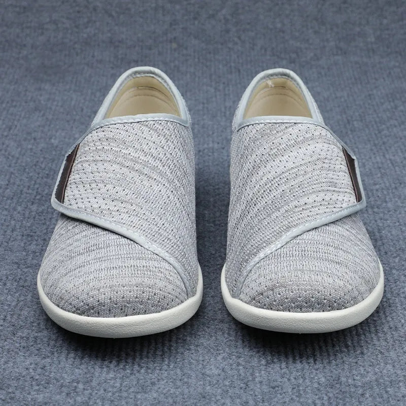 Leisure shoes for elderly with Velcro strap, textile and synthetic leather upper, round toe.