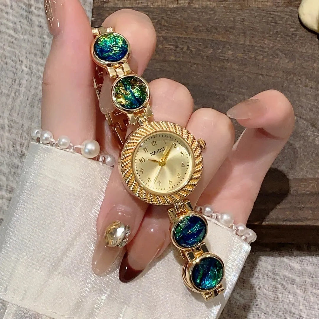 Women's quartz watch with 25mm round dial in six colour options showing zinc alloy case