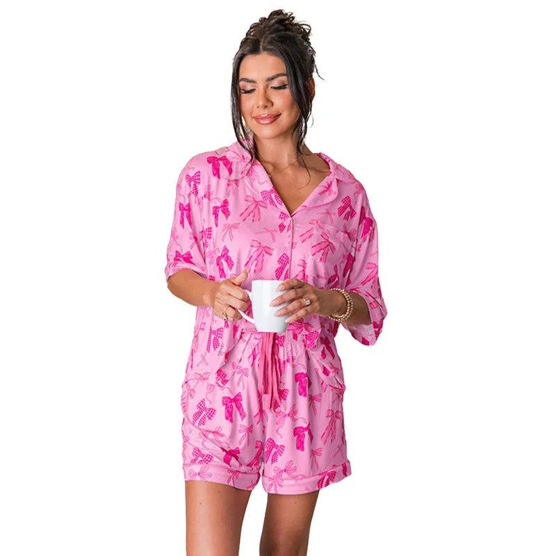 Pink women's pyjama set with bow print, two-piece polyester sleepwear