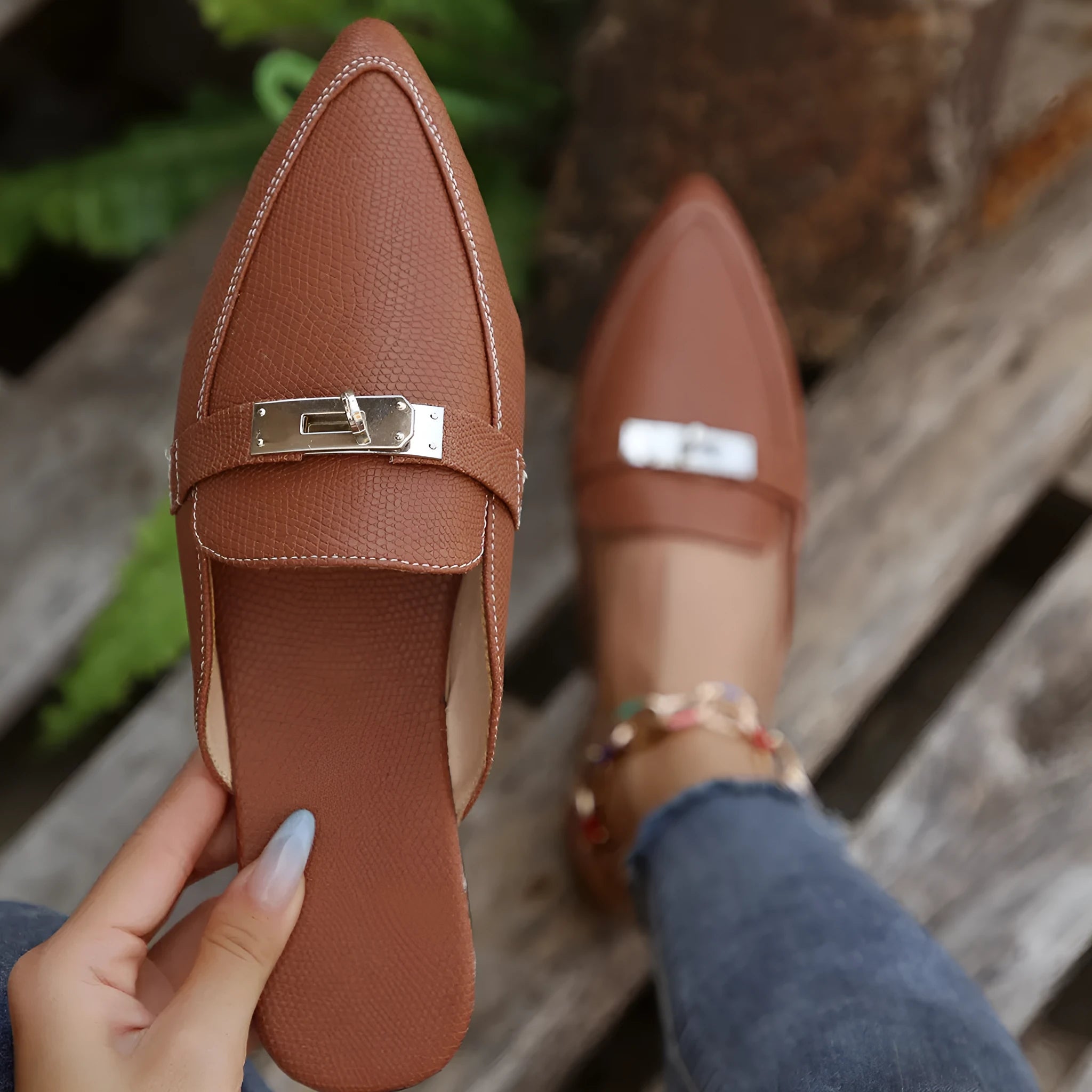 Light brown women's pointed-toe casual slip-on shoes with a low heel and rubber sole.