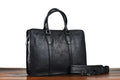 Men's brown leather horizontal business handbag with zipper closure