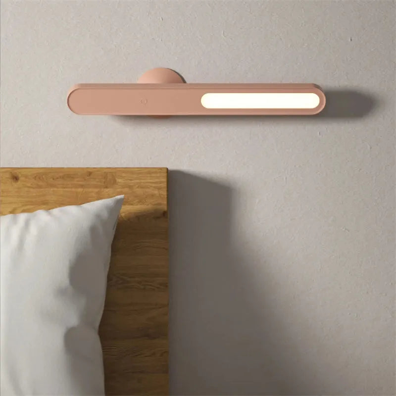 White geometric desk lamp with magnetic suction base and touch control on wooden desk