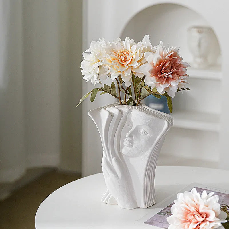 Ceramic book stand in modern style with glazed finish, shown in one of four colour designs
