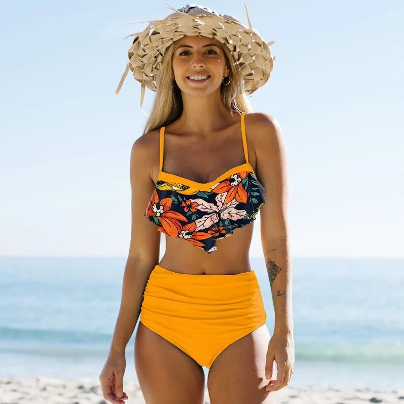 Blue high-waist pleated pants bikini swimsuit for women laid flat.