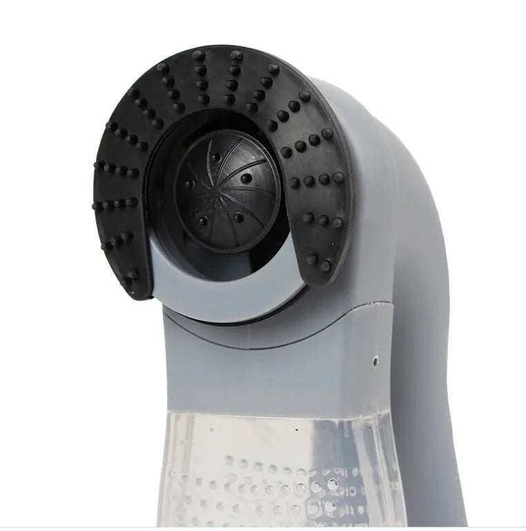 Grey handheld pet hair vacuum cleaner with soft rubber grooming head for dogs and cats