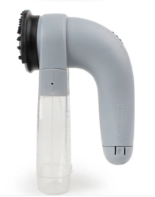 Grey handheld pet hair vacuum cleaner with soft rubber grooming head for dogs and cats