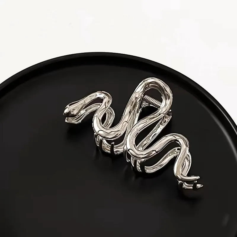 Slytherin serpentine metal hair barrette in silver or gun black finish measuring 10.5cm