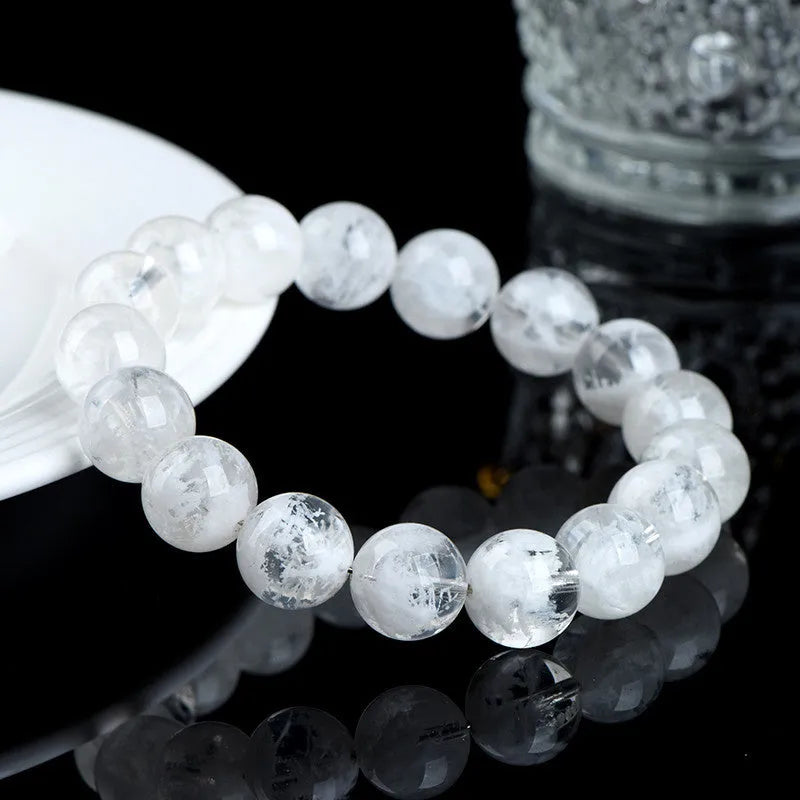 Women's crystal bracelet with natural blizzard snowflake round beads and geometric Ruyi Xiangyun design