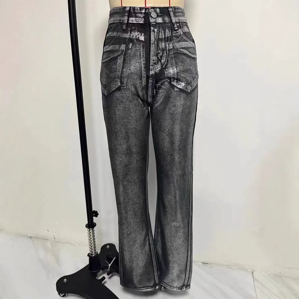 Washed blue high-waist straight-leg jeans with contrast colour detailing on a denim background.