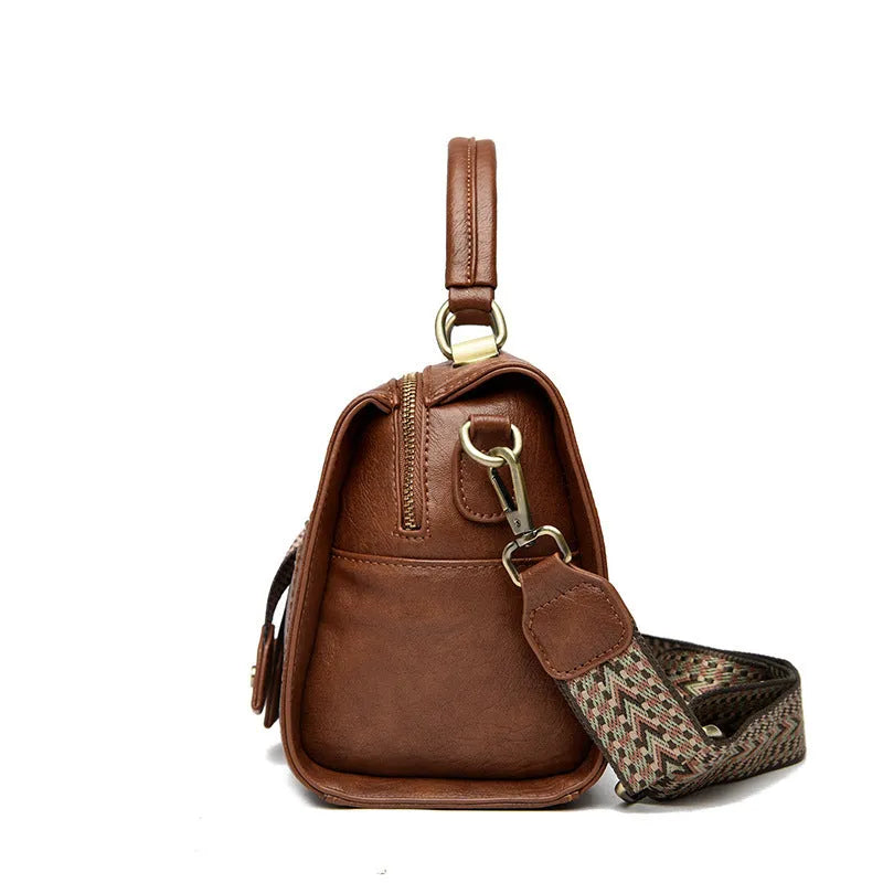 Gray soft PU leather women's crossbody bag with a horizontal square shape and a front sandwich pocket.