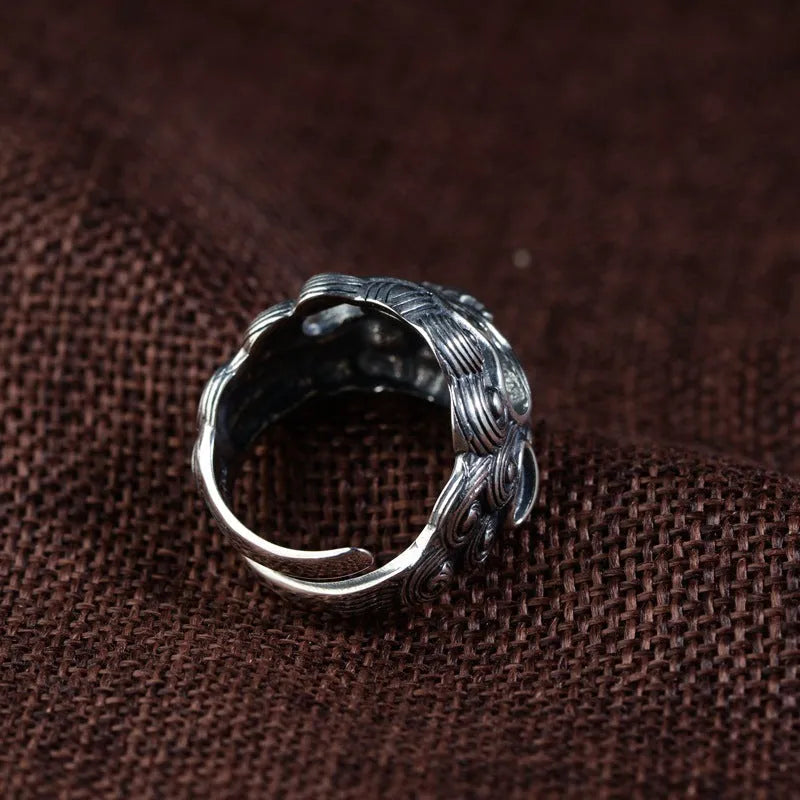 Sterling silver open ring with detailed Domineering Diamond and Jibeast animal pattern.