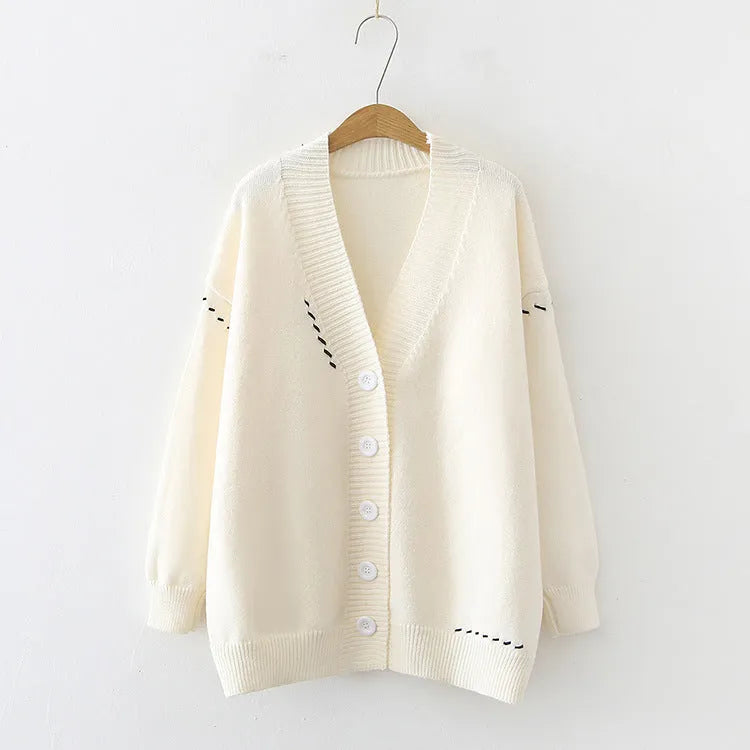 Women's loose black knitted cardigan coat with long sleeves