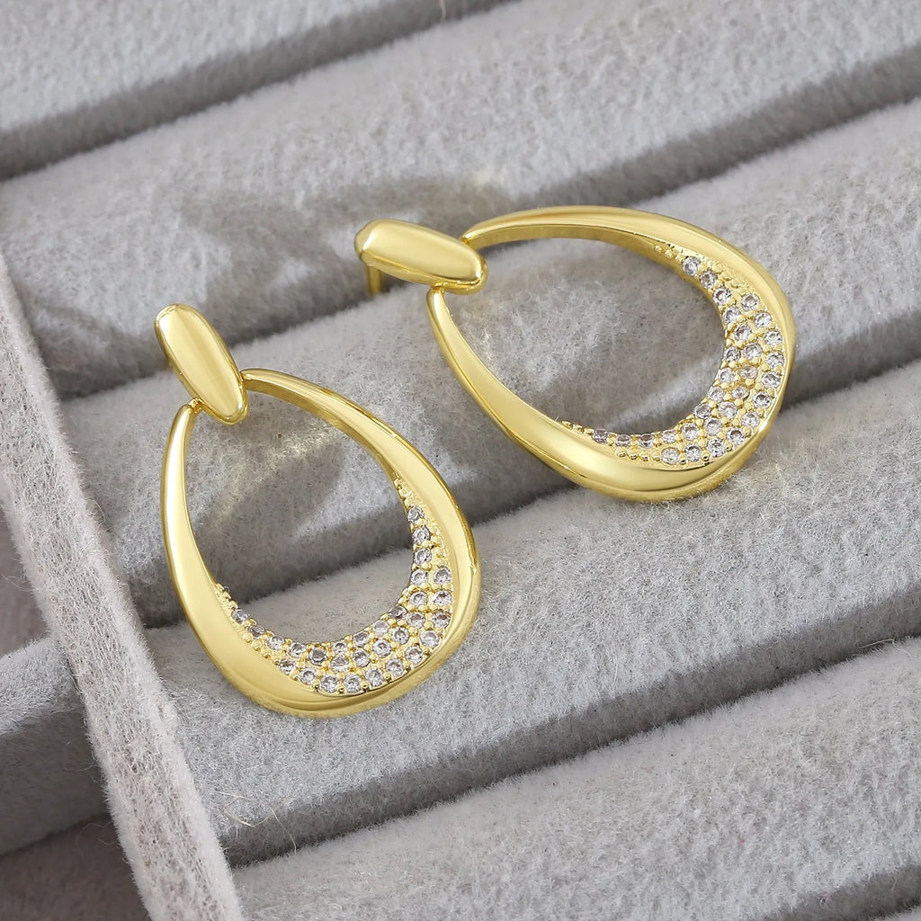 Yellow gold geometric drop-shaped women's earrings with a simple design.