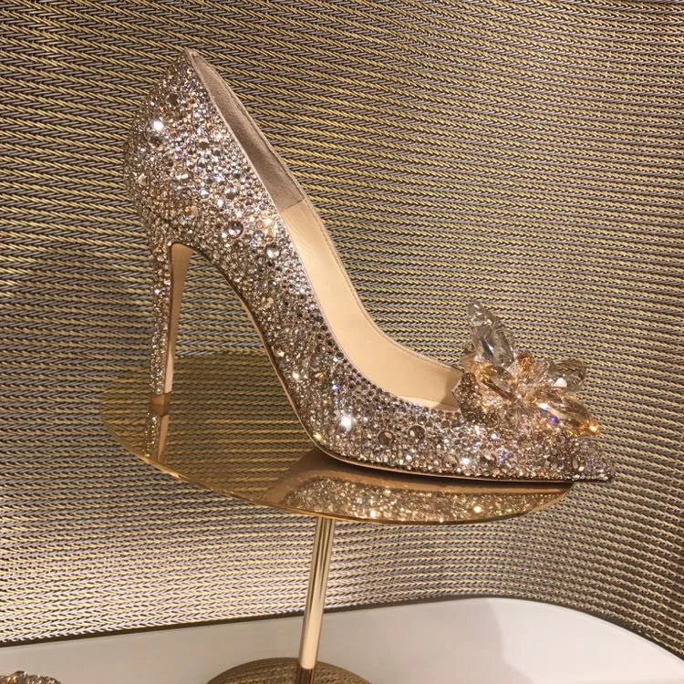 Women's gold pointed toe stiletto heels with sequin cloth upper and rhinestone decoration
