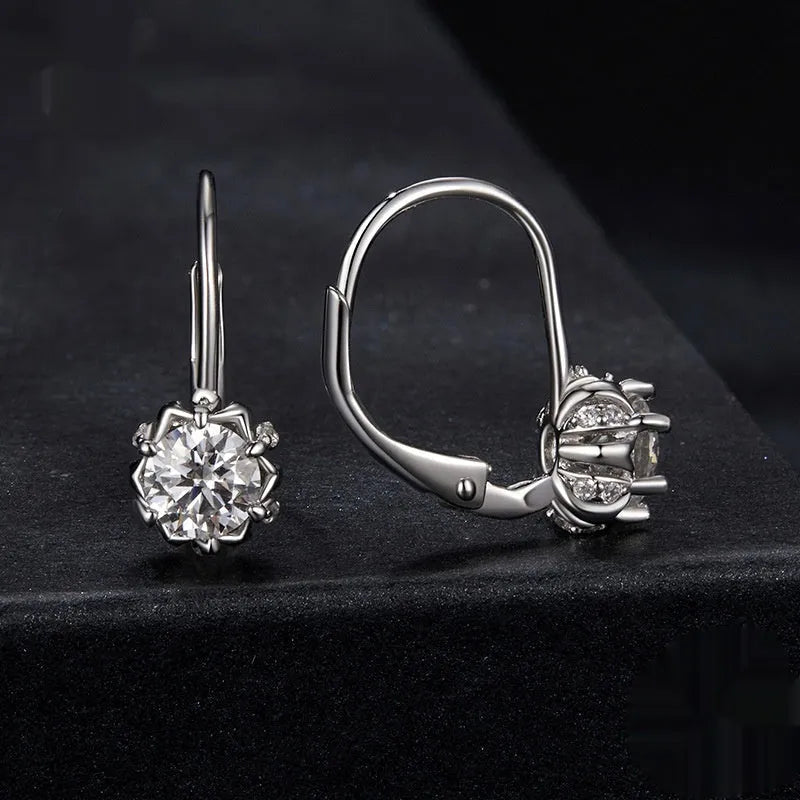 Sterling silver flower bud ear clip with white gold plating and moissanite stones