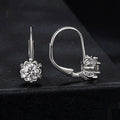 Sterling silver flower bud ear clip with white gold plating and moissanite stones