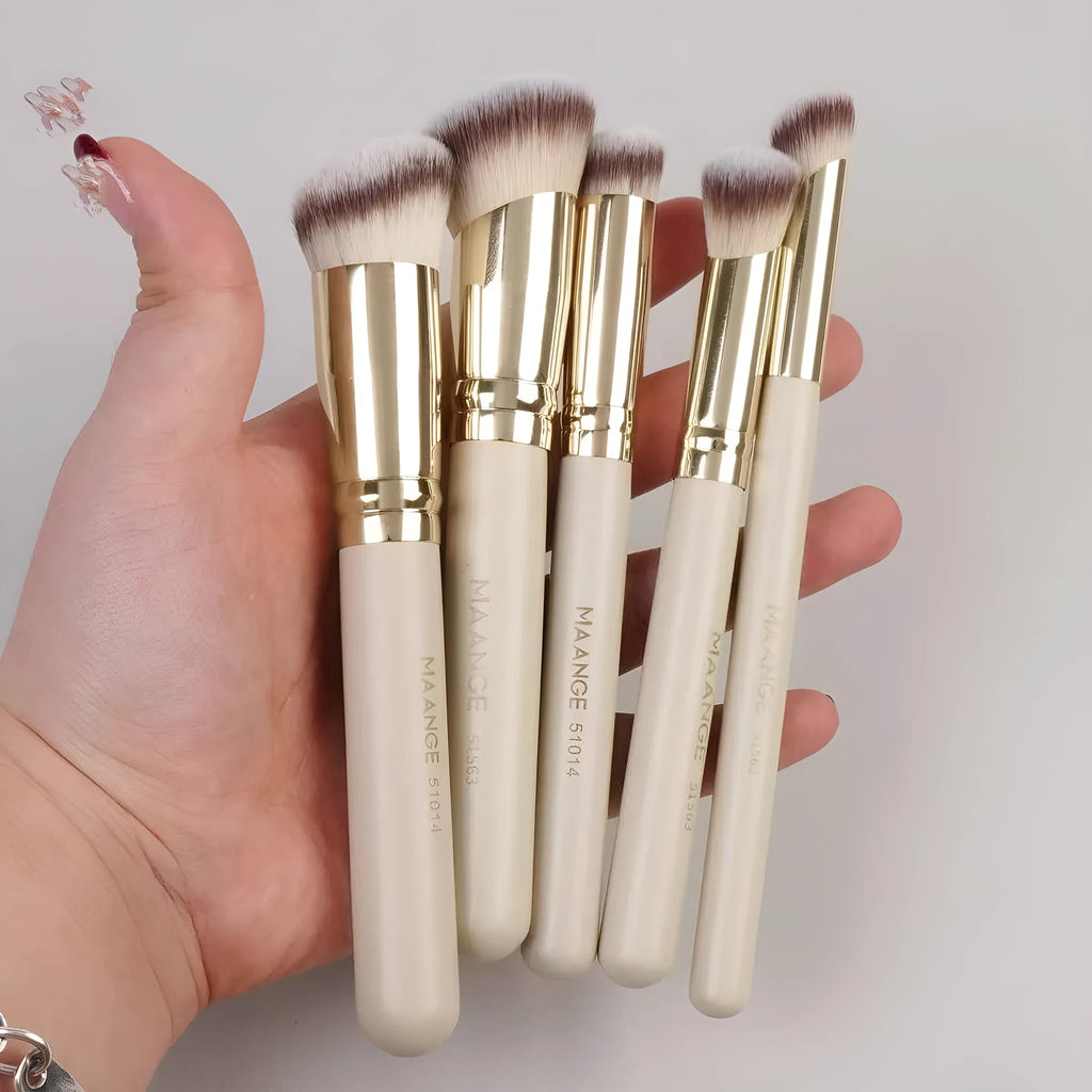 Apricot coloured 5-piece angled makeup brush set with synthetic bristles for powder and blush application