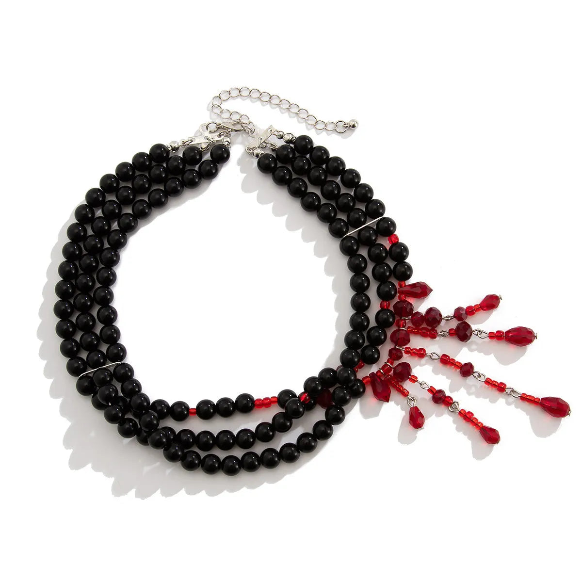 Men's Halloween necklace with red and black crystal blood drop pendant and pearl tassels on an adjustable chain