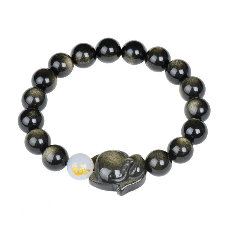 10mm obsidian zodiac bracelet on wrist showing adjustable cord closure and polished stone beads